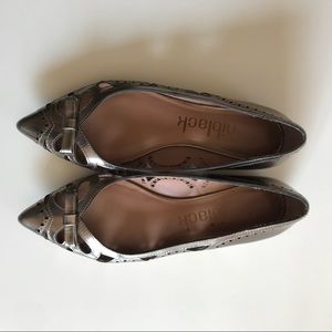 Daniblack silver pointed toe flats lace cutouts